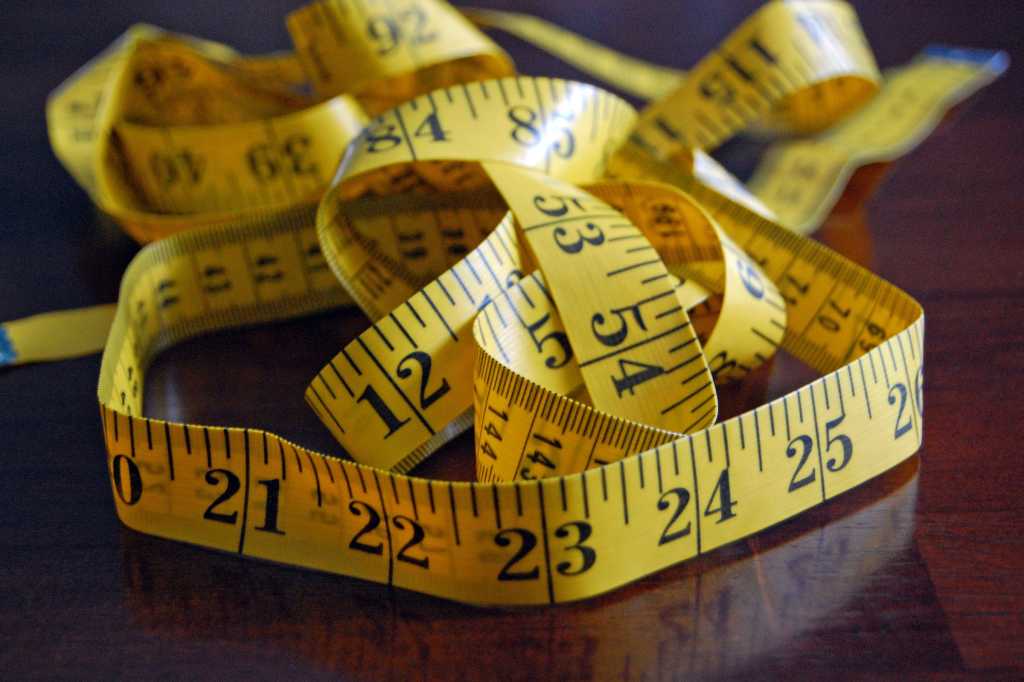 measure yellow measuring tape tangled intertwined by jamie via flickr