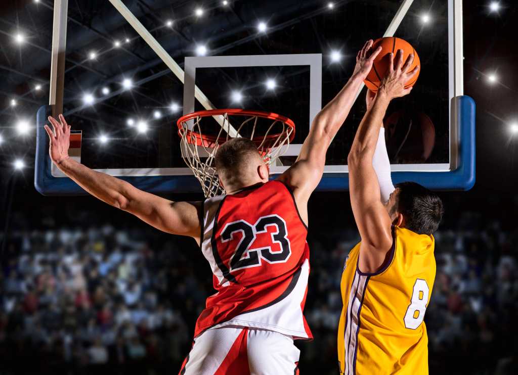 shutterstock 1877180950 basketball blocked shot blocked dunk basketball players in action in arena