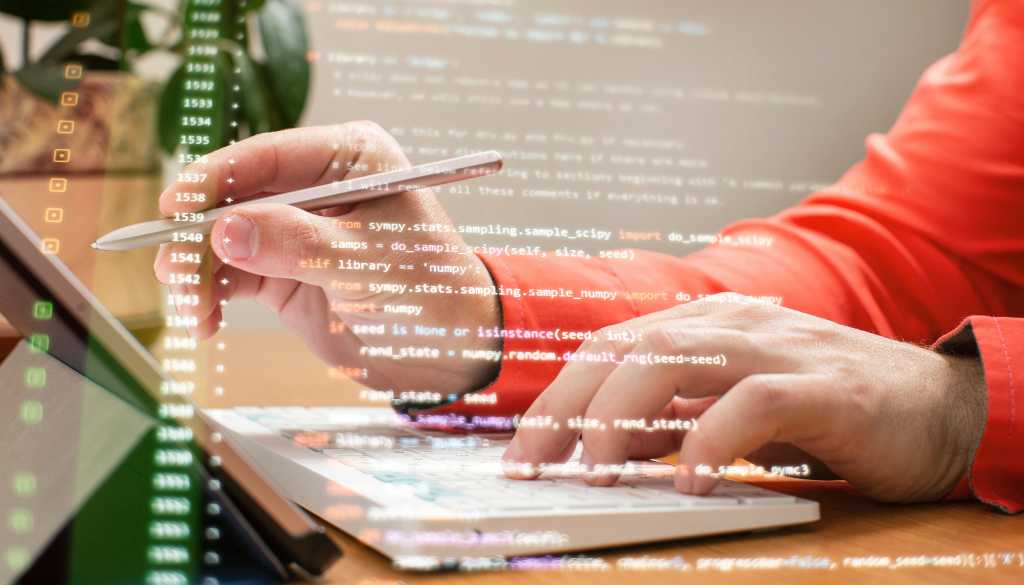 Programming, programmer's hands on a keyboard.