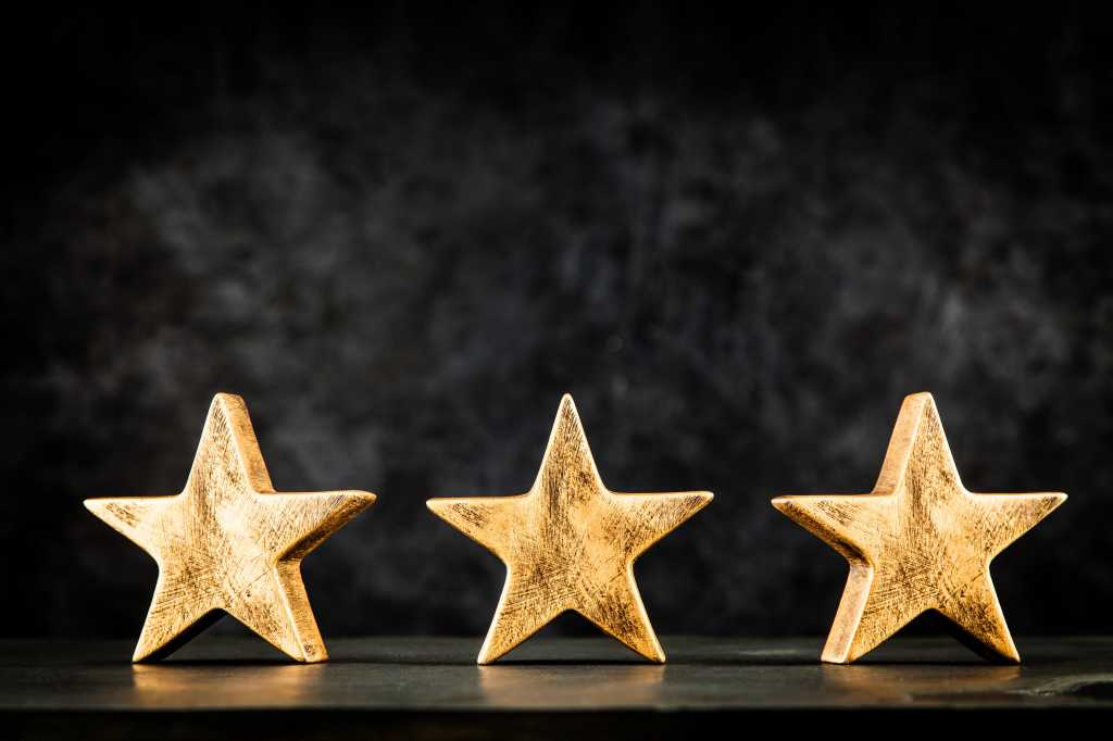 3 stars, award, dark background